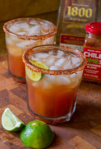 This Life Changing Spicy Michelada is a spicy Mexican take on the classic beer + tomato juice, spiced up with a zesty lime + salt rim for that extra bite!