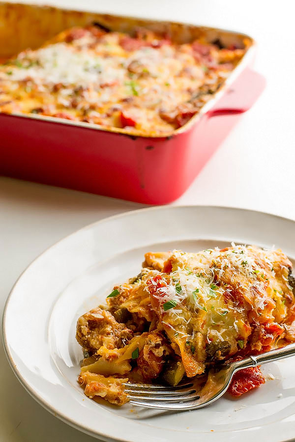 Extra Cheesy Zucchini Lasagna with Spicy Sausage. A fast, easy and delicious recipe from OneSimpleFeast.com 